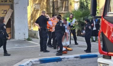 אישה חולצה במצב בינוני משריפה בבניין מגורים ברחוב יל"ג (צילום: דוברות כבאות והצלה מחוז חוף)